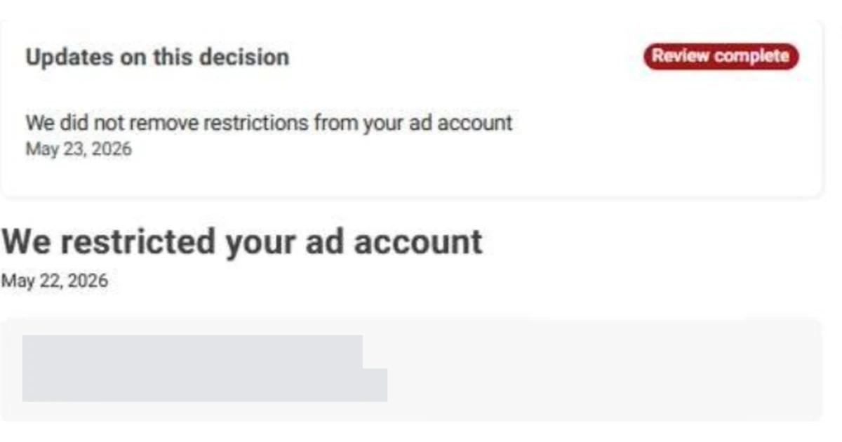 Meta notice reading We did not remove restrictions from your ad account, marked review complete, above the original restriction notice
